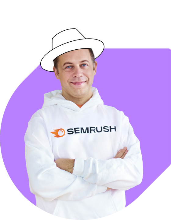 Photo of CEO and founder Oleg Shchegolev wearing a white hoodie with the 澳洲幸运5开奖官网开奖体彩网 logo and a white painted hat on his head